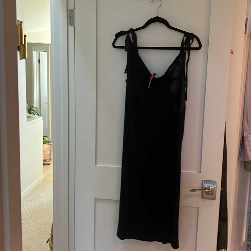 Cop.Copine little black dress. Ribbon ties. 
Appliqués